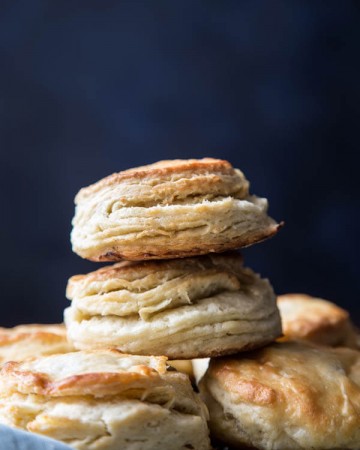 A stack of flaky buttermilk biscuits