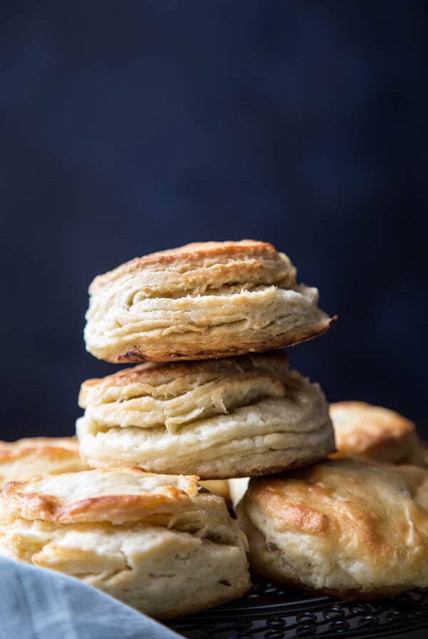 A stack of flaky buttermilk biscuits