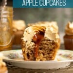 A caramel apple cupcake cut in half on a plate.