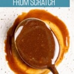 A spoon of dulce de leche on a plate.