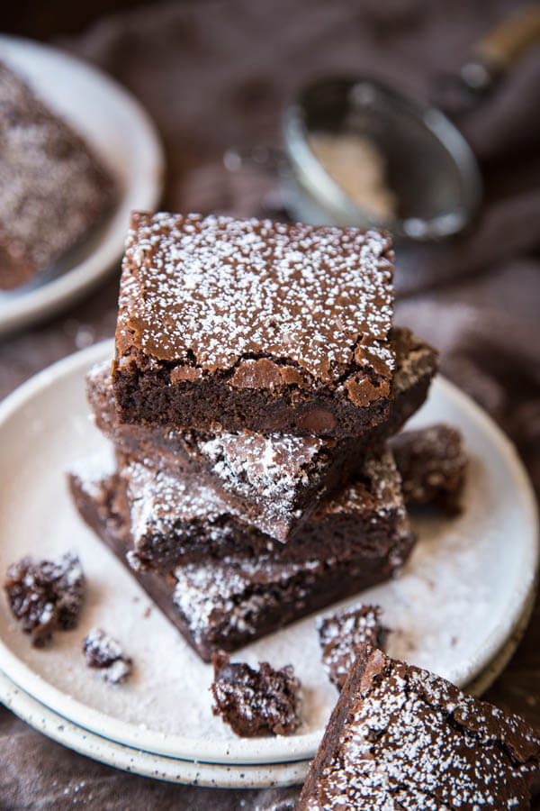 A stack of easy homemade brownies on a plate