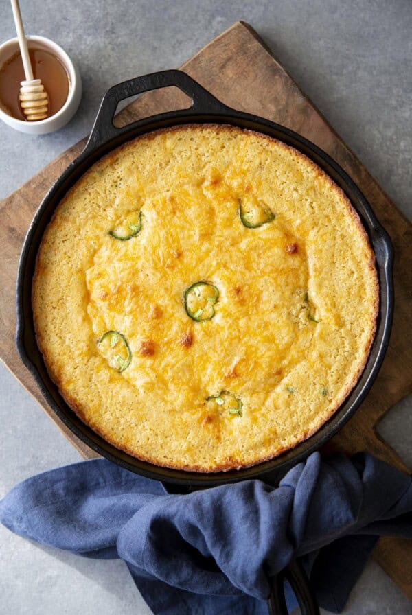 Jalapeno Cheddar Cornbread in a cast iron skillet.