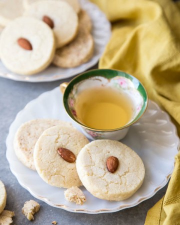 Almond Shortbread Cookies on a plate with tea