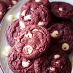 A batch of baked red velvet cookies on a platter
