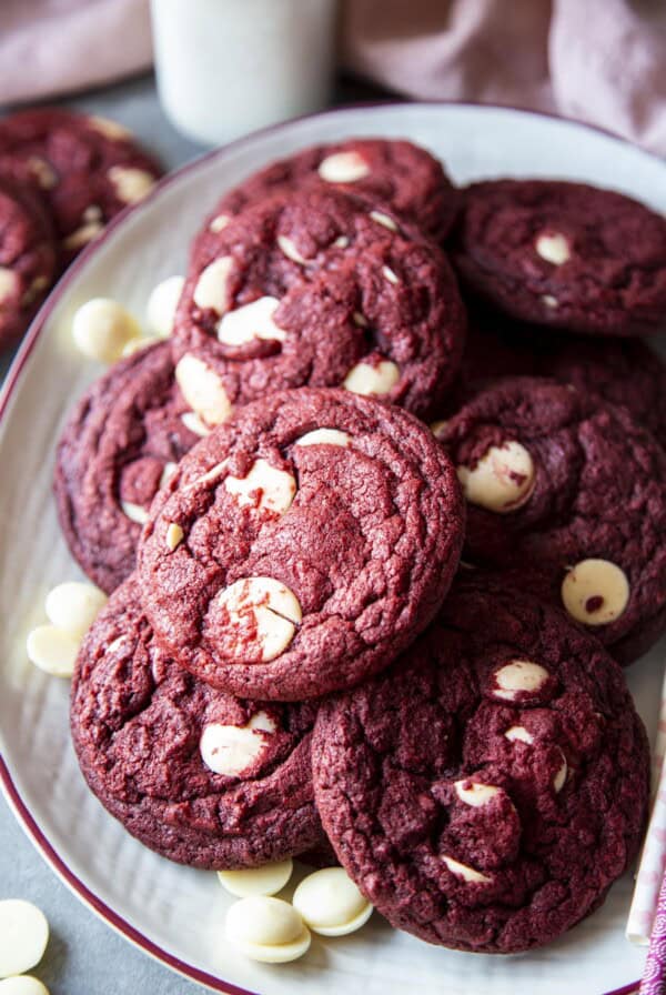 A batch of baked red velvet cookies on a platter