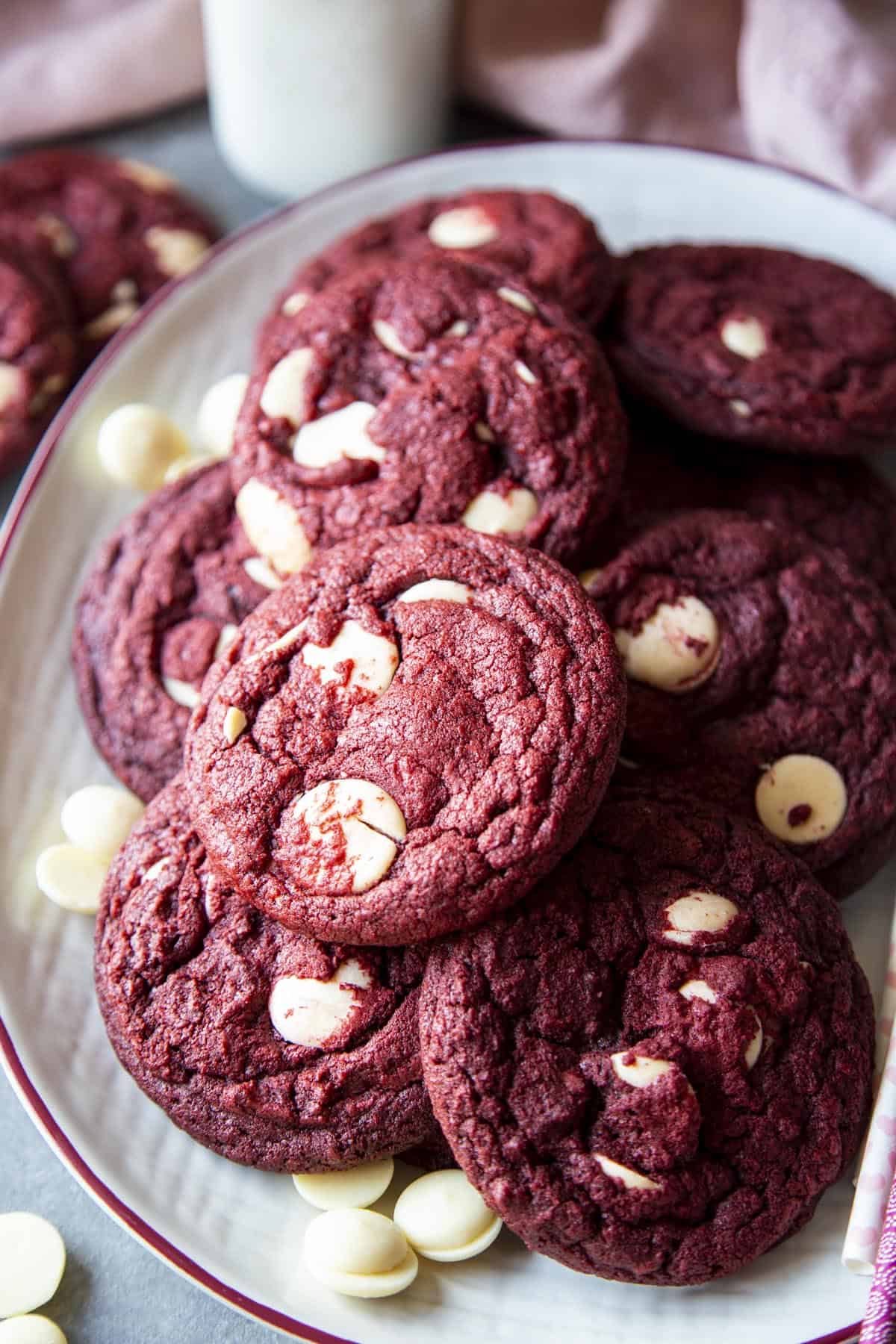A batch of baked red velvet cookies on a platter 