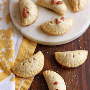 With flaky crust and cheesy, sweet filling, these Guava Cream Cheese Mini Hand Pies are even better than Porto's guava pastries! | wildwildwhisk.com