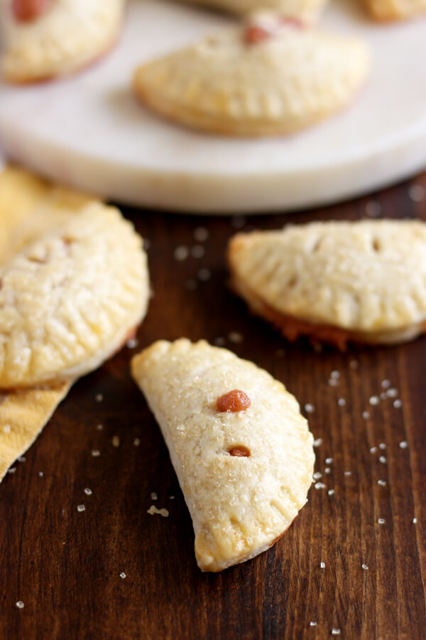 With flaky crust and cheesy, sweet filling, these Guava Cream Cheese Mini Hand Pies are even better than Porto's guava pastries! | wildwildwhisk.com