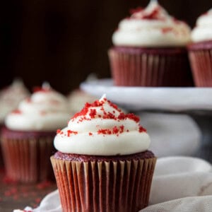A red velvet cupcake with cream cheese frosting