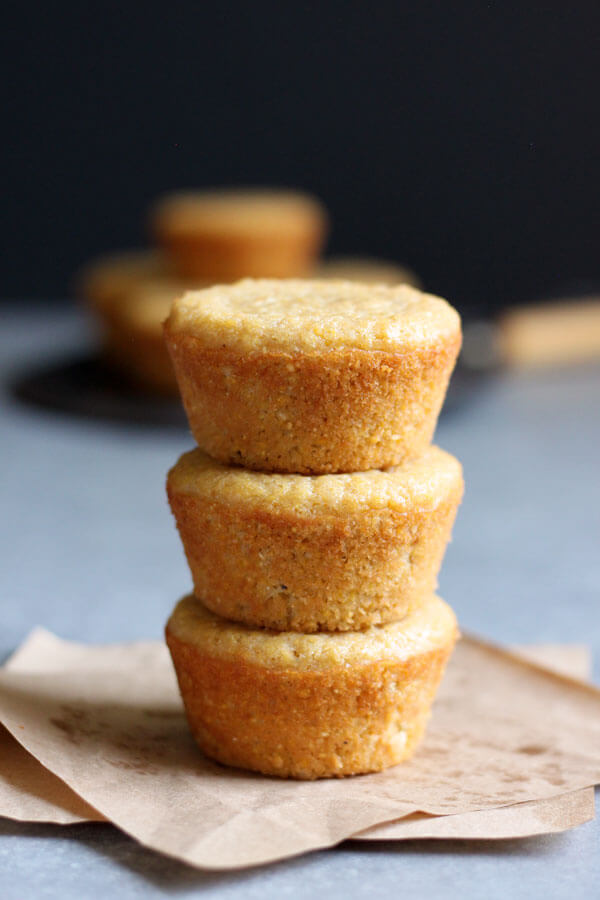 A stack of 3 sweet cornbread muffins