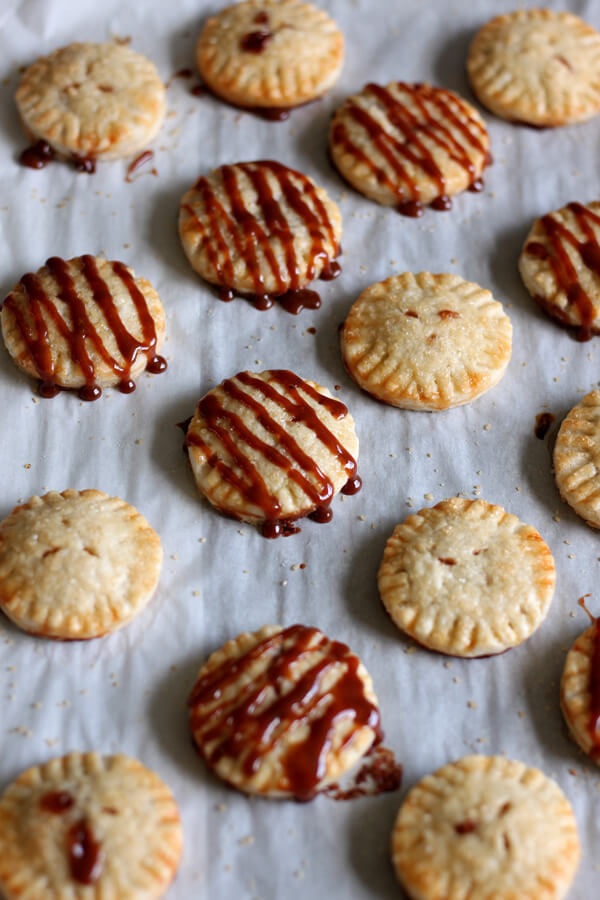 Cute little cookie like Dulce de Leche Petite Pie made with flaky buttery crust and oozing with homemade Dulce de Leche goodness! | wildwildwhisk.com