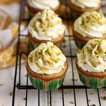 These Pistachio Cupcakes with Orange Mascarpone Frosting are made with real pistachio, no pudding mix allowed! The orange mascarpone whipped cream frosting is so fresh, fluffy and light.