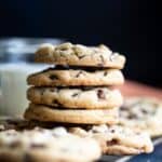 A stack of 4 chocolate chip cookies.
