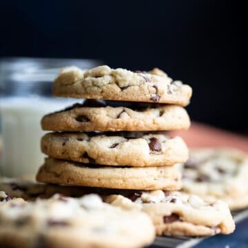 A stack of 4 chocolate chip cookies.