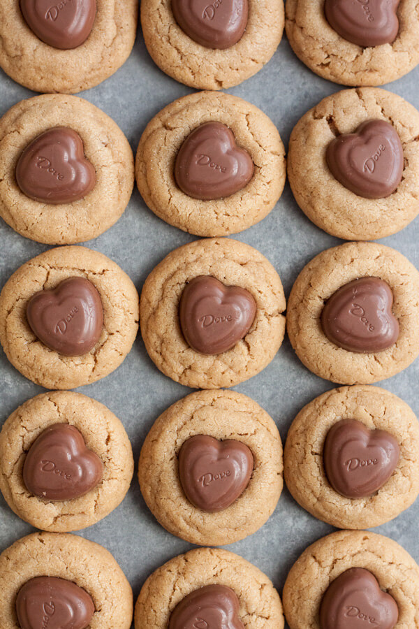 These cute little Peanut Butter Heart Blossom Cookies are perfect to pass around the office during Valentine’s Day. Switch the heart chocolate out with chocolate kisses for an everyday treat that everyone will love!
