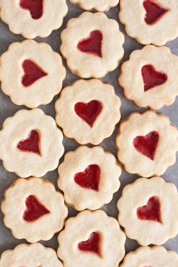Shortbread cookies with red heart shaped stained glass windows