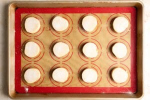 Unbaked shortbread cookies on a baking sheet.