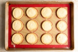 Baked shortbread cookies on a baking sheet.
