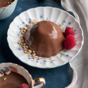 Lightened Up Chocolate Panna Cotta is a delicious dairy free version of a decadent dessert. This version of Panna Cotta will add a little sweetness to your day while still keep you on track with all of your New Year resolutions. | wildwildwhisk.com