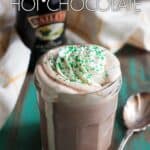 Baileys hot chocolate with whipped cream in a glass jar.