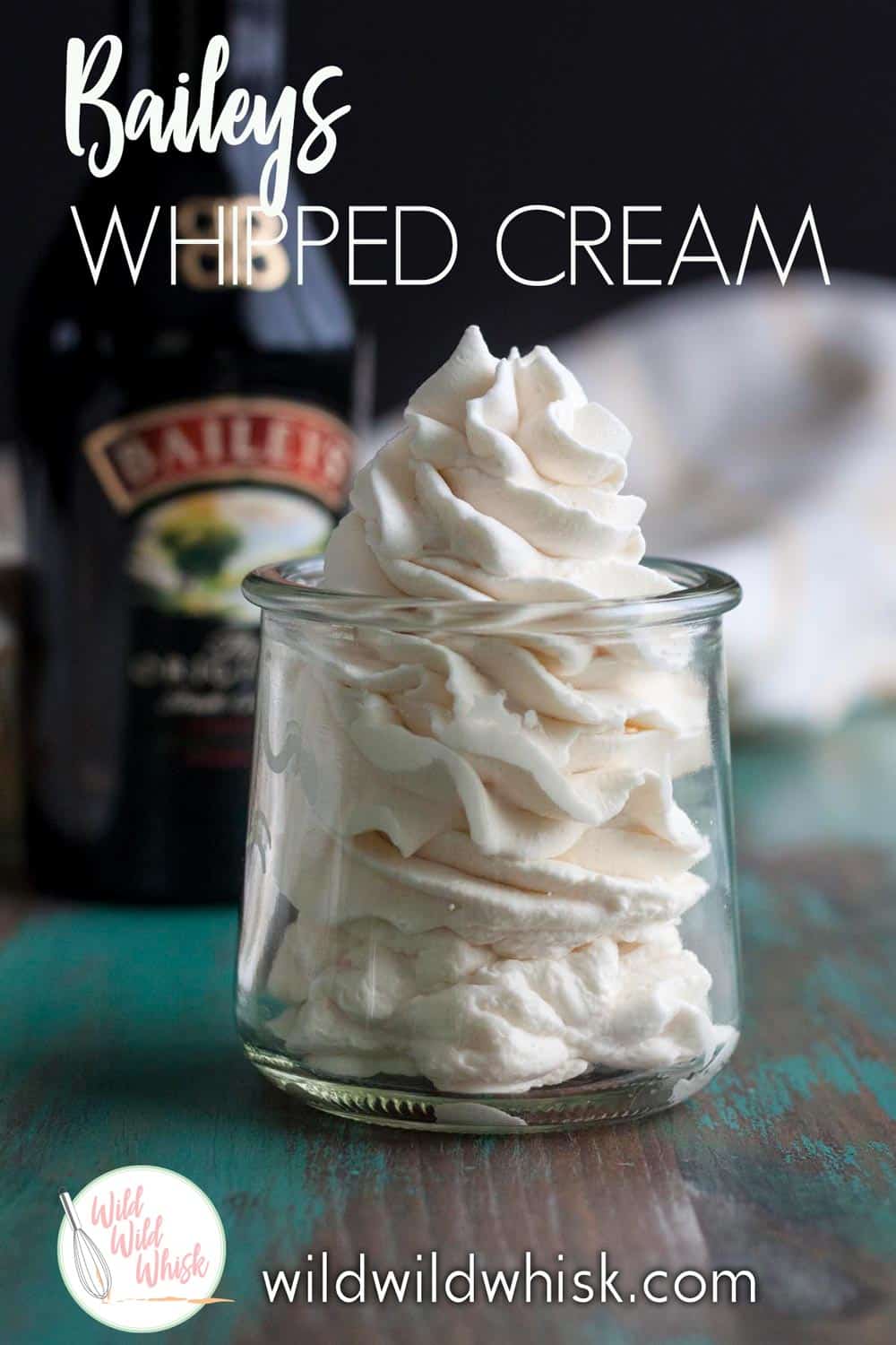 This Irish Cream Whipped Cream is slightly sweet and extra boozy. It’s the perfect homemade whipped cream with just a little kick to get this party started. | wildwildwhisk.com #irishcream #whippedcream