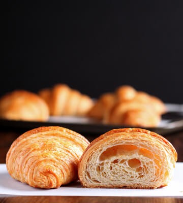 Photo of a Croissant cut open to show the crumbs