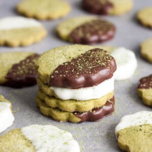 A stack of chocolate dipped Matcha Green Tea Shortbread Cookies