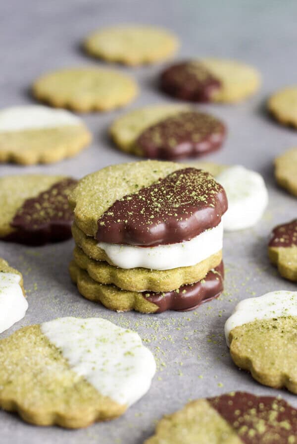 A stack of chocolate dipped Matcha Green Tea Shortbread Cookies
