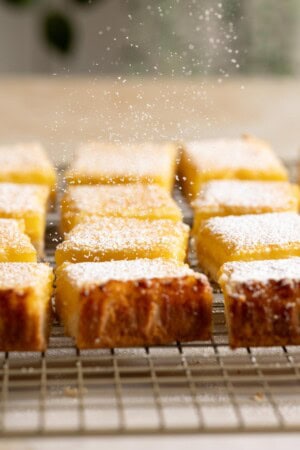 Dust powdered sugar on top of lemon bars before serving.