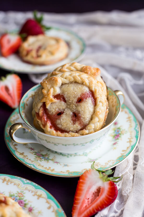 Strawberry Compote Hand Pies in a tea cup