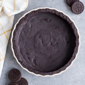 Oreo Cookie Pie Crust in a tart pan.
