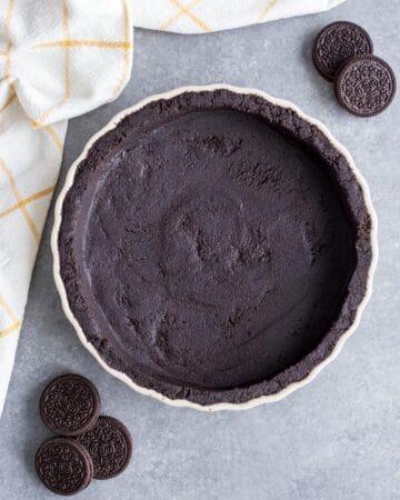 Oreo Cookie Pie Crust in a tart pan.