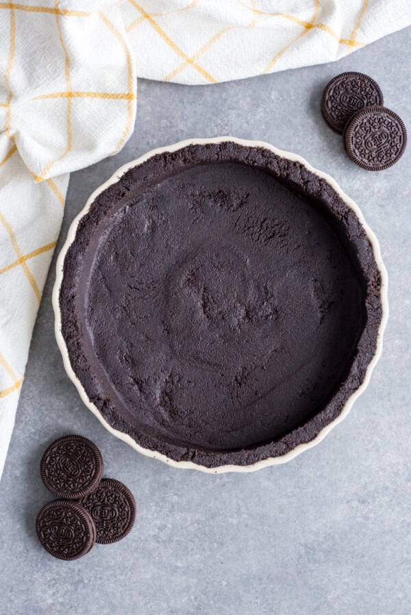 Oreo Cookie Pie Crust in a tart pan.