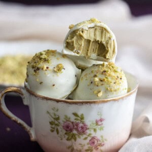 White Chocolate Pistachio Truffles in a tea cup