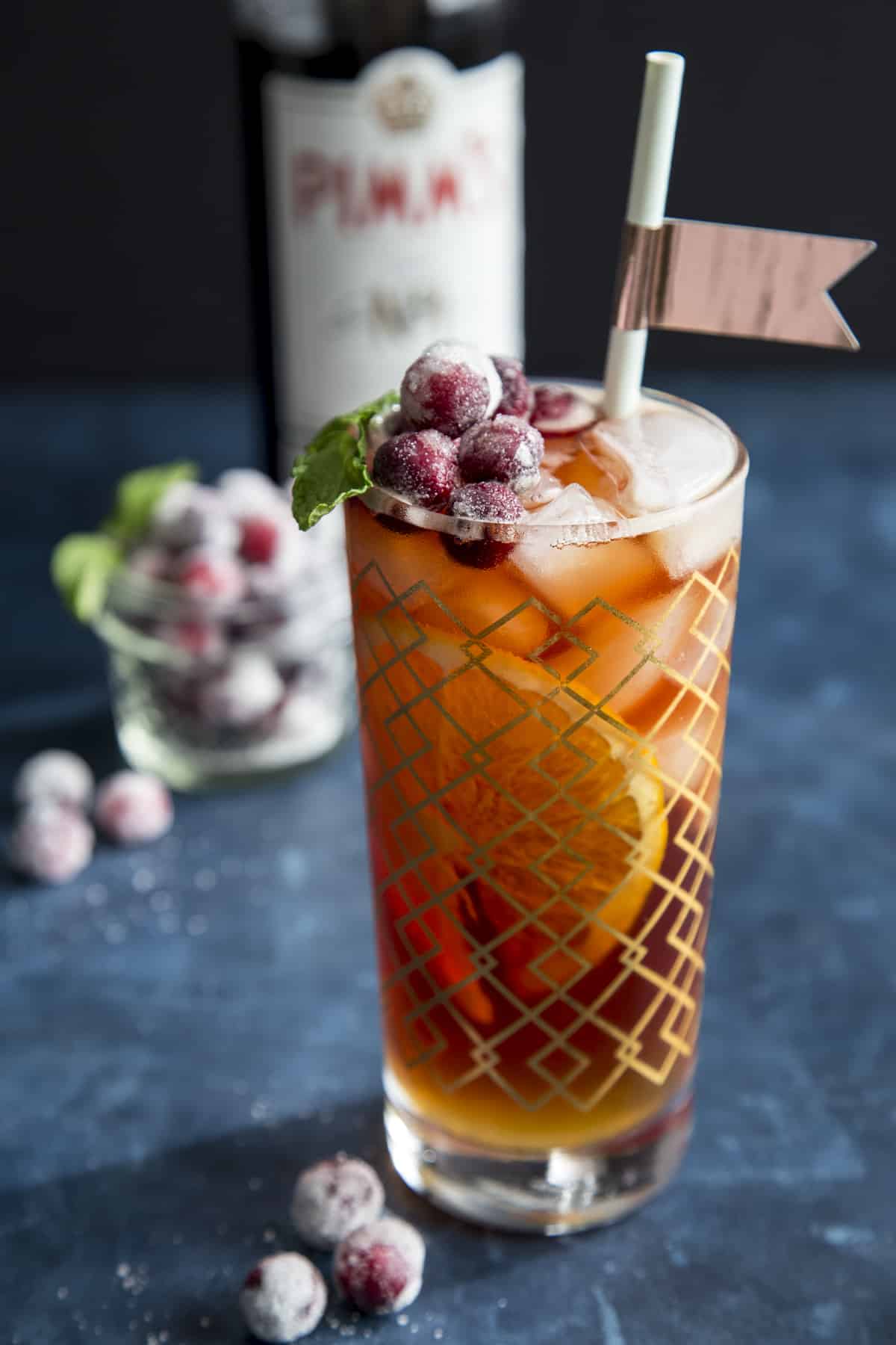 Cranberry Pimm's Cup cocktail in a highball glass