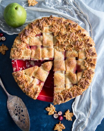 Pear Pie with cranberries in a red pie dish