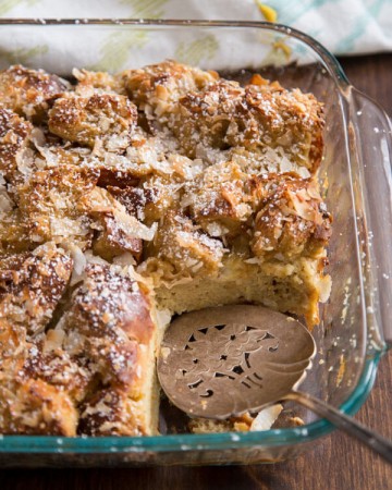 Coconut French toast casserole in a glass baking dish