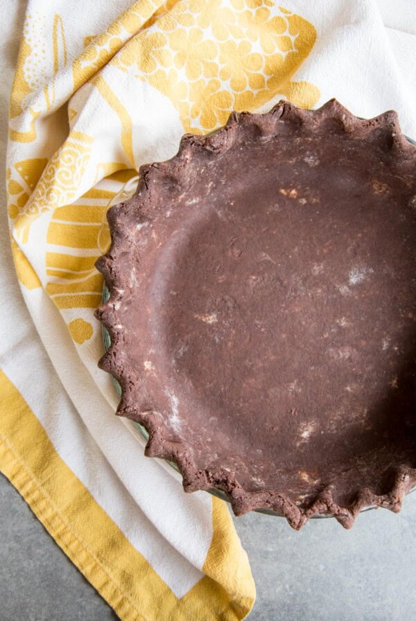 Unbake Chocolate Pie Crust next to a yellow towel.