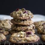 A stack of pistachio oatmeal cranberry cookies