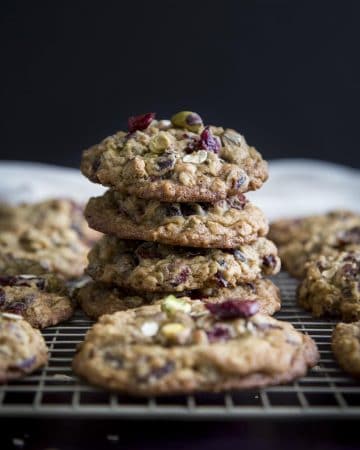 A stack of pistachio oatmeal cranberry cookies