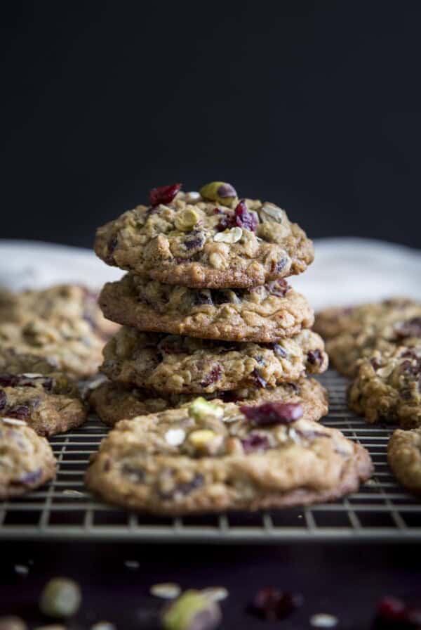 A stack of pistachio oatmeal cranberry cookies