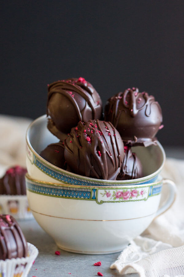 Raspberry Truffles stacked inside a tea cup