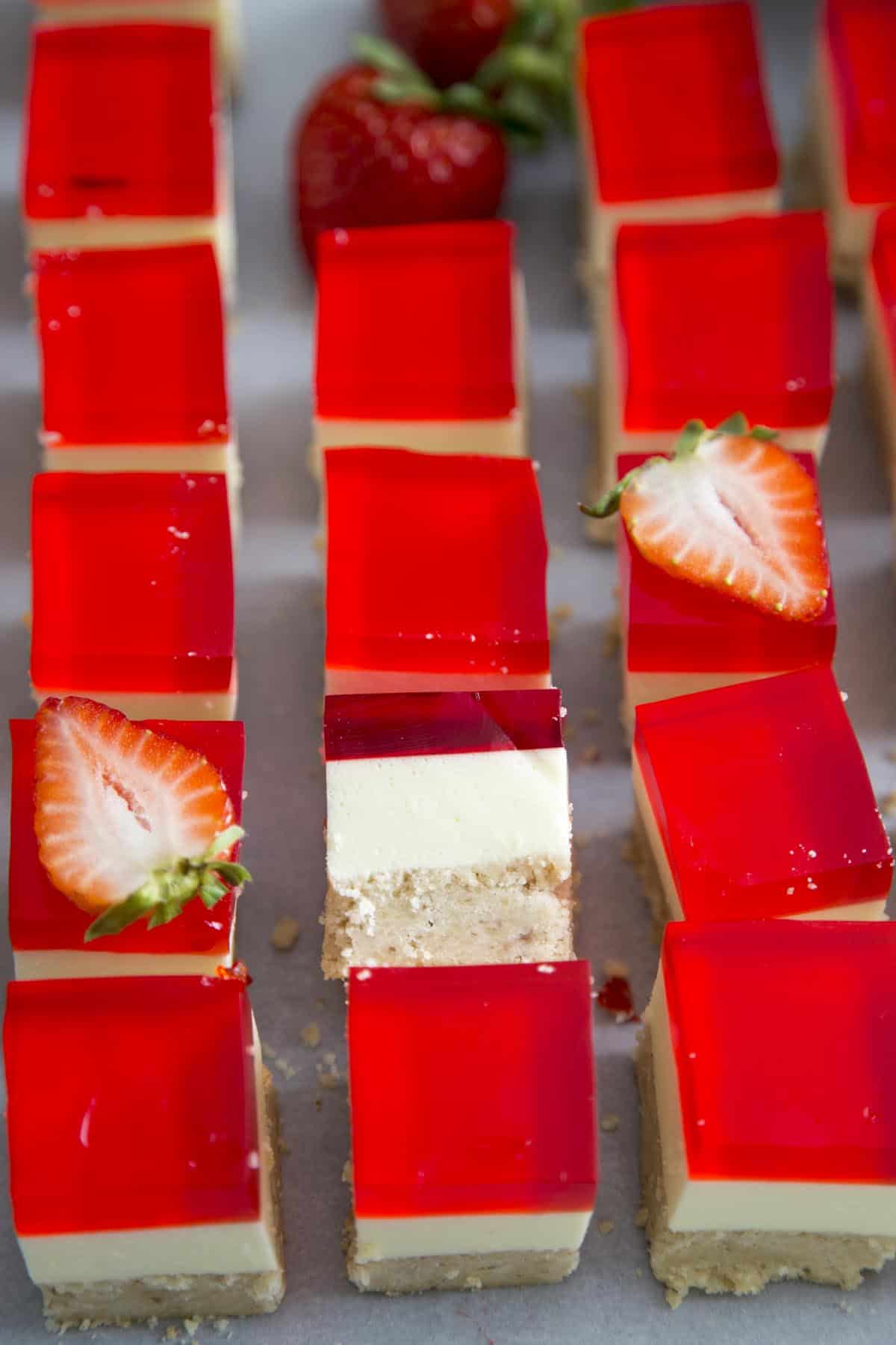 Strawberry Jello Dessert Bars cut into squares
