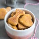 Sweet Potato Dog Treats in a small white and pink bowl.