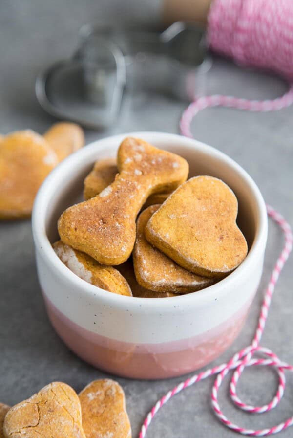 Sweet Potato Dog Treats in a small white and pink bowl.