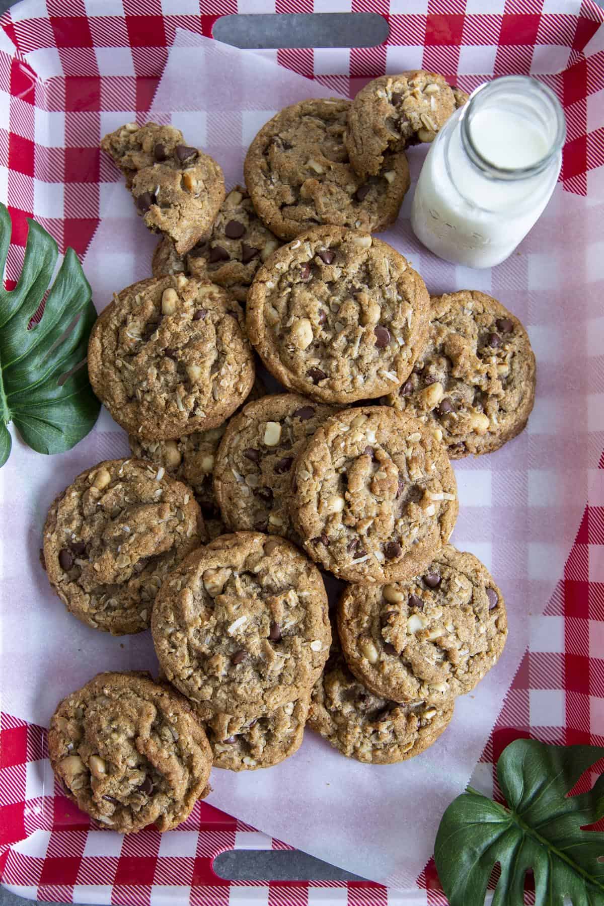 A batch of Hawaiian Kitchen Sink Cookies in a red and white tray.