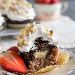 The inside of a banana split cupcake