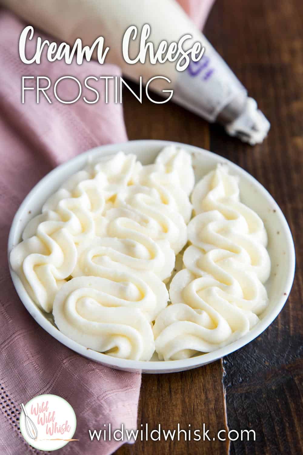 This classic Cream Cheese Frosting is creamy, tangy and super addicting. It has just the right amount of sweetness to bring out the flavor of your cakes! #wildwildwhisk #creamcheesefrosting