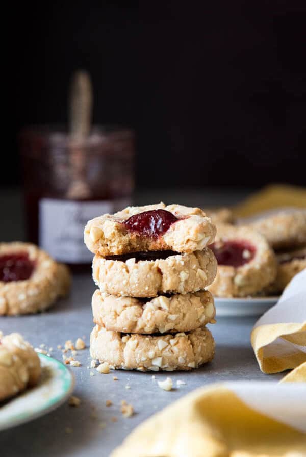 A stack of jam thumbprint cookies