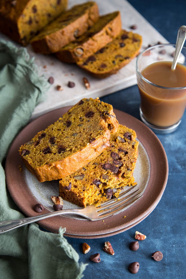 Chocolate chip pumpkin bread slices on a plate